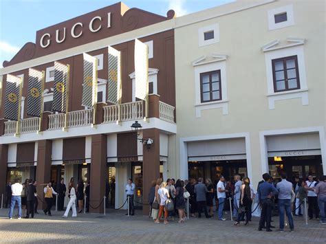 fashion village dittaino gucci|gucci outlet italy.